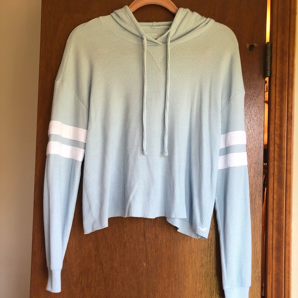 a hollister xs loose shirt with hood